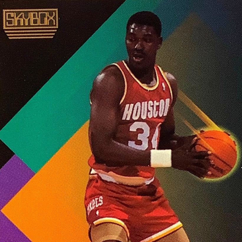 Akeem Olajuwon, Card #110, Houston Rockets, 1990 NBA Skybox NM+